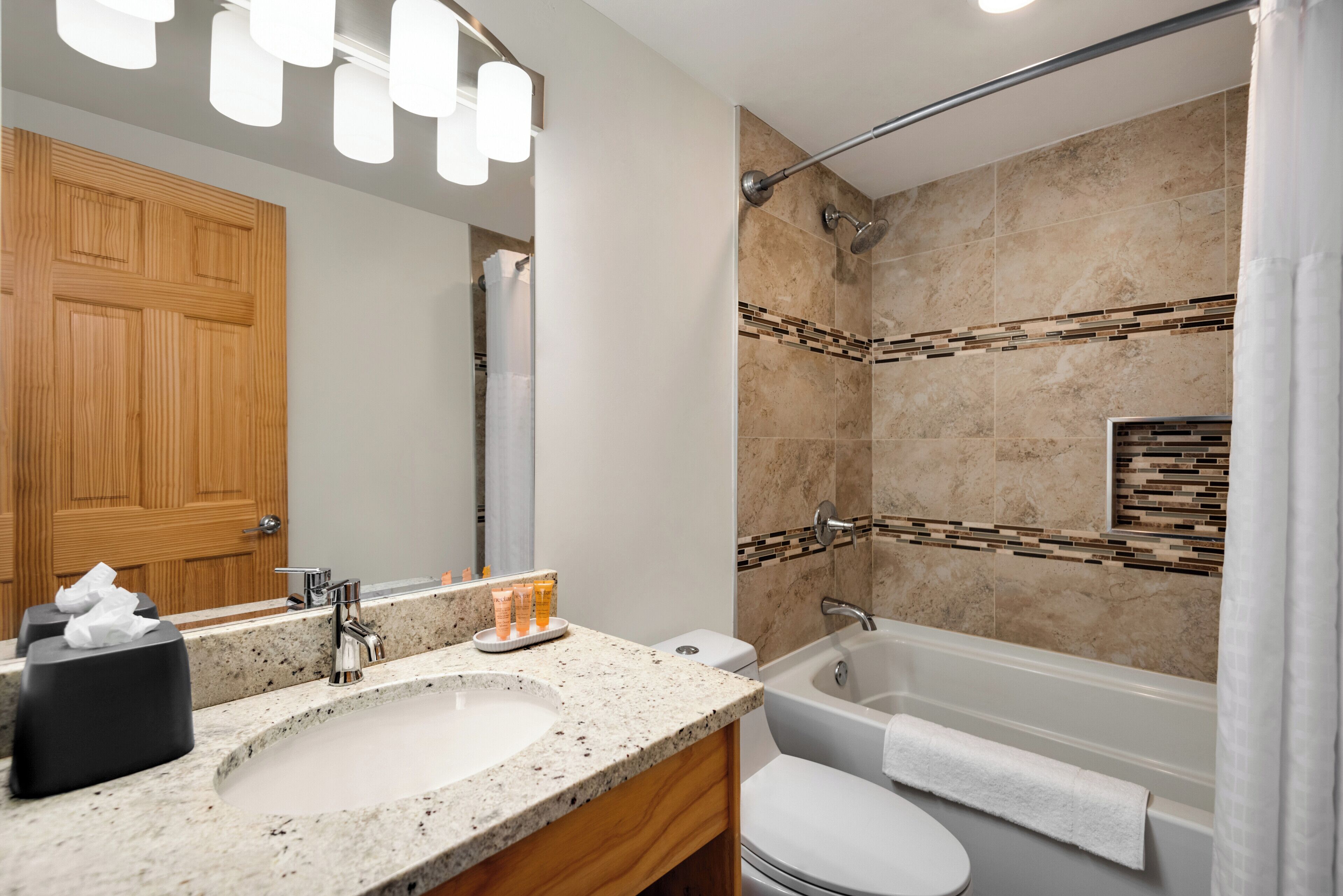 superior apartment, 2 bedrooms, kitchen, mountain view | bathroom | combined shower/bathtub, deep-soaking bathtub, free toiletries