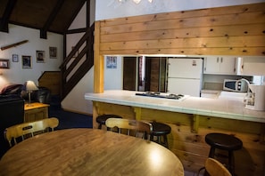 Family Cabin, 2 Double Beds with Fireplace | Living area
