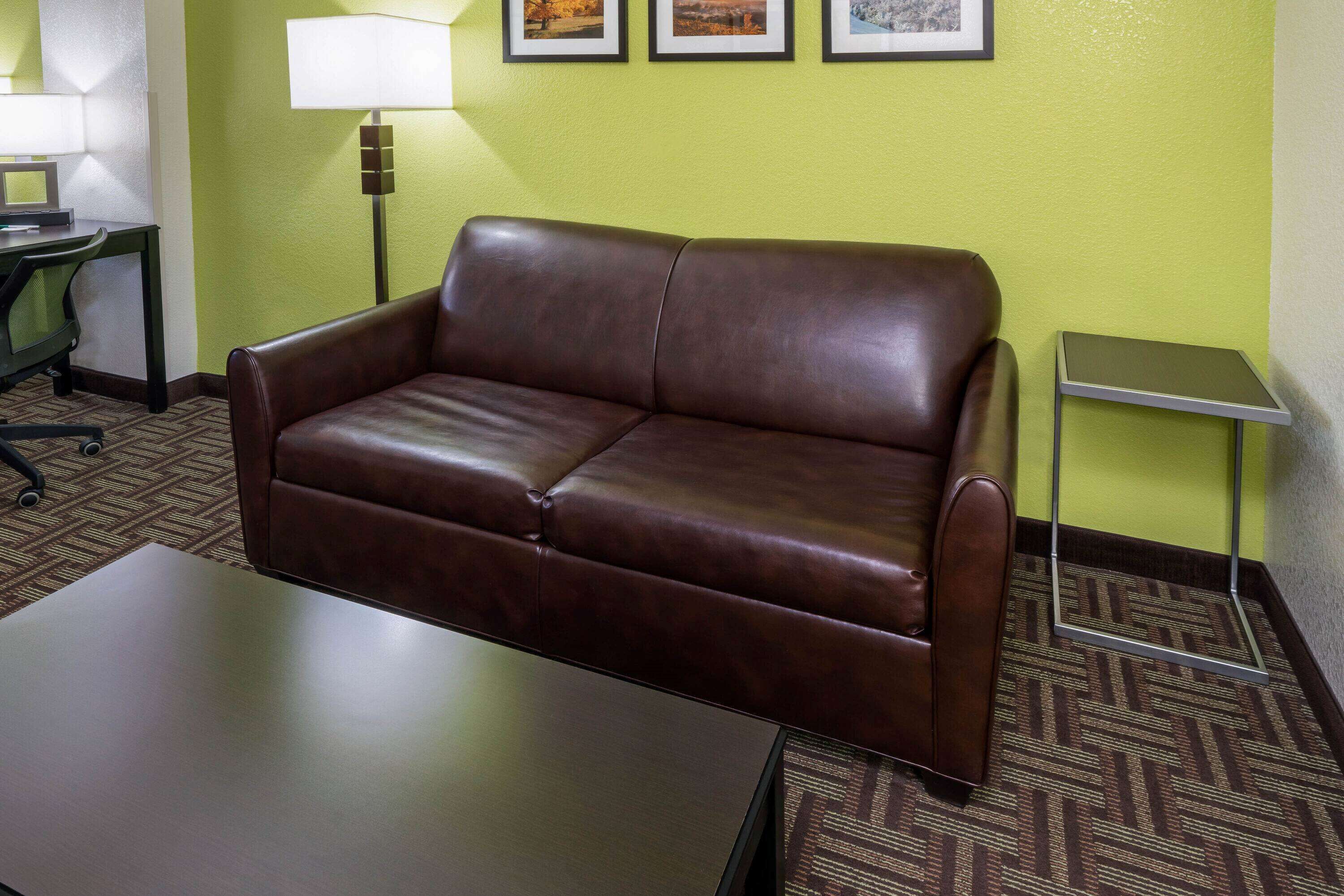 deluxe suite, 1 king bed, non smoking | premium bedding, desk, iron/ironing board, free cots/infant beds