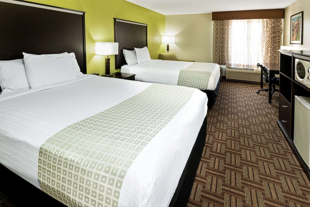 room, 2 queen beds, non smoking | premium bedding, desk, iron/ironing board, free cots/infant beds