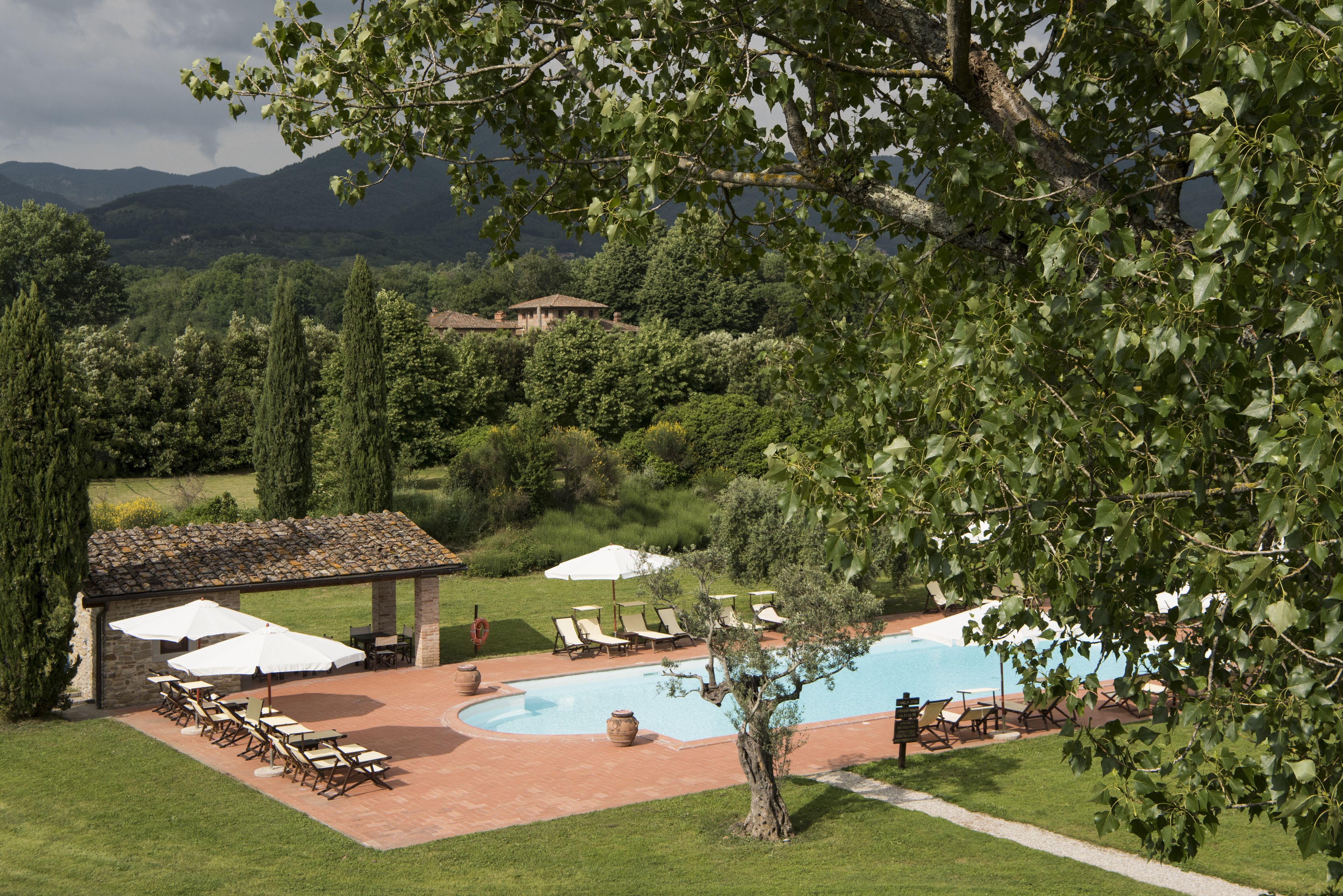 2 outdoor pools, pool umbrellas, pool loungers