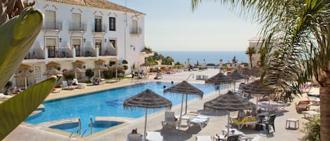 Outdoor pool, pool umbrellas, pool loungers