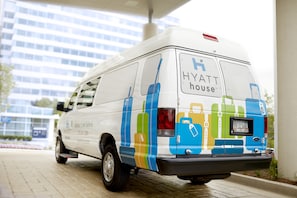 Hyatt house van parked on the hotel's driveway.