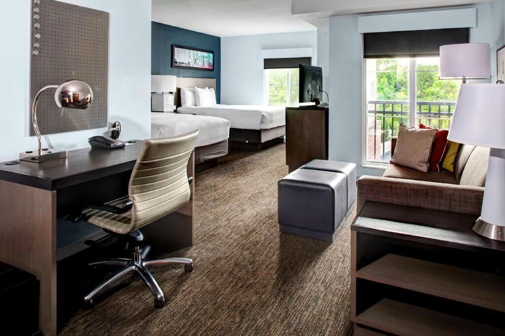 Premium bedding, pillow-top beds, desk, blackout curtains