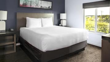 Premium bedding, pillow-top beds, desk, blackout curtains