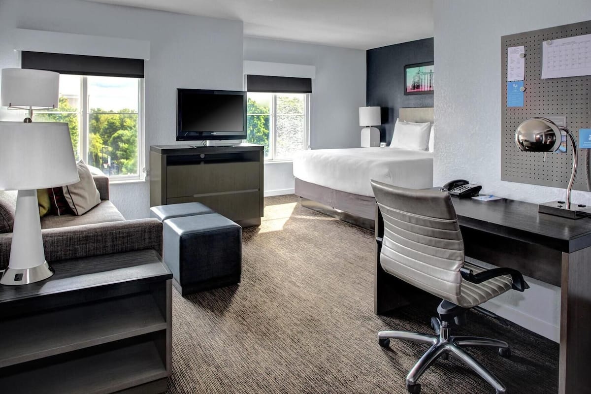Premium bedding, pillow-top beds, desk, blackout curtains