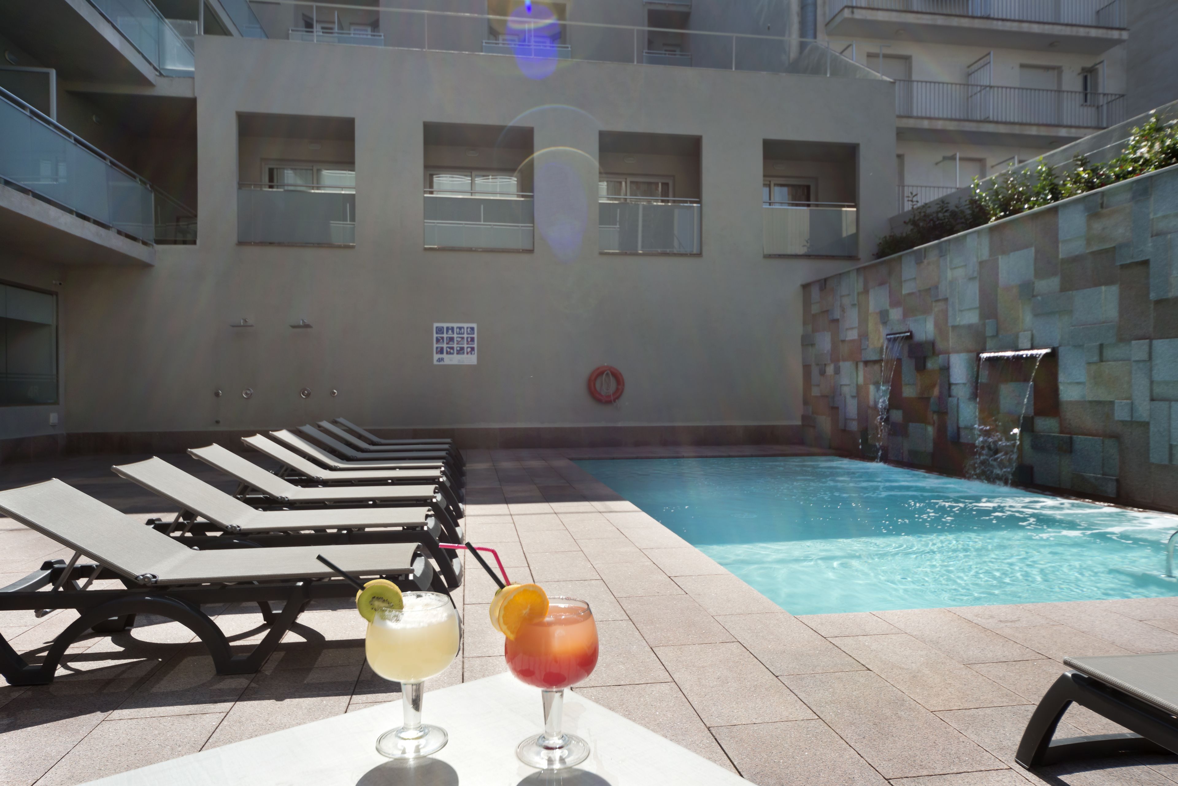 outdoor pool, pool loungers