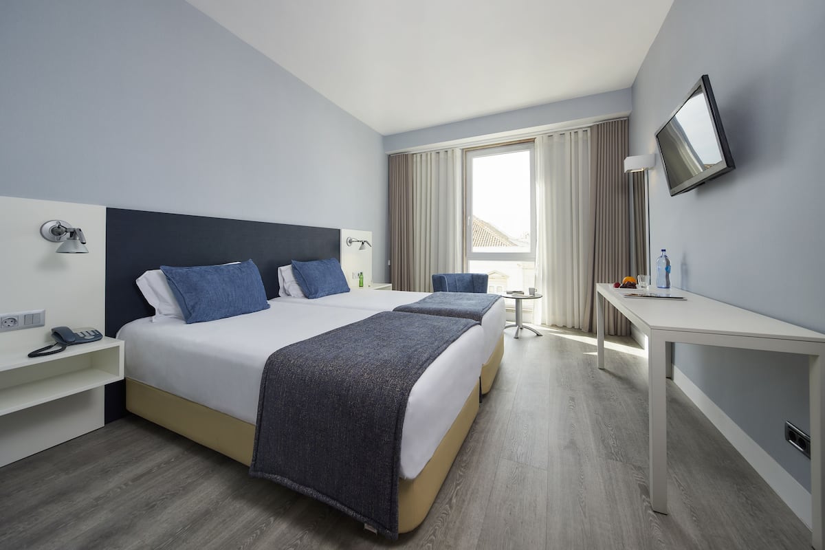 Minibar, caja fuerte, cortinas opacas y sistema de insonorización