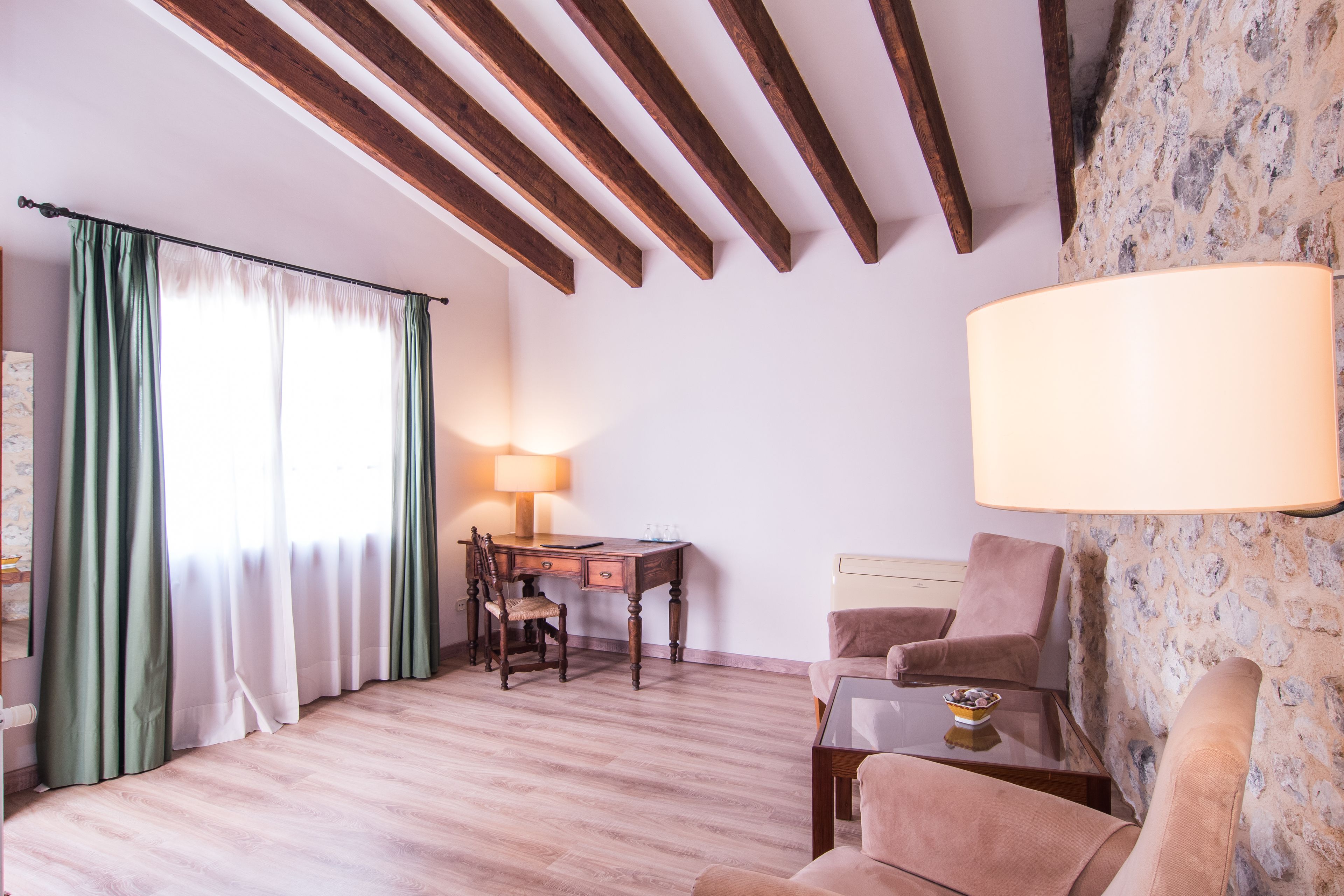 premium bedding, down duvets, memory-foam beds, in-room safe