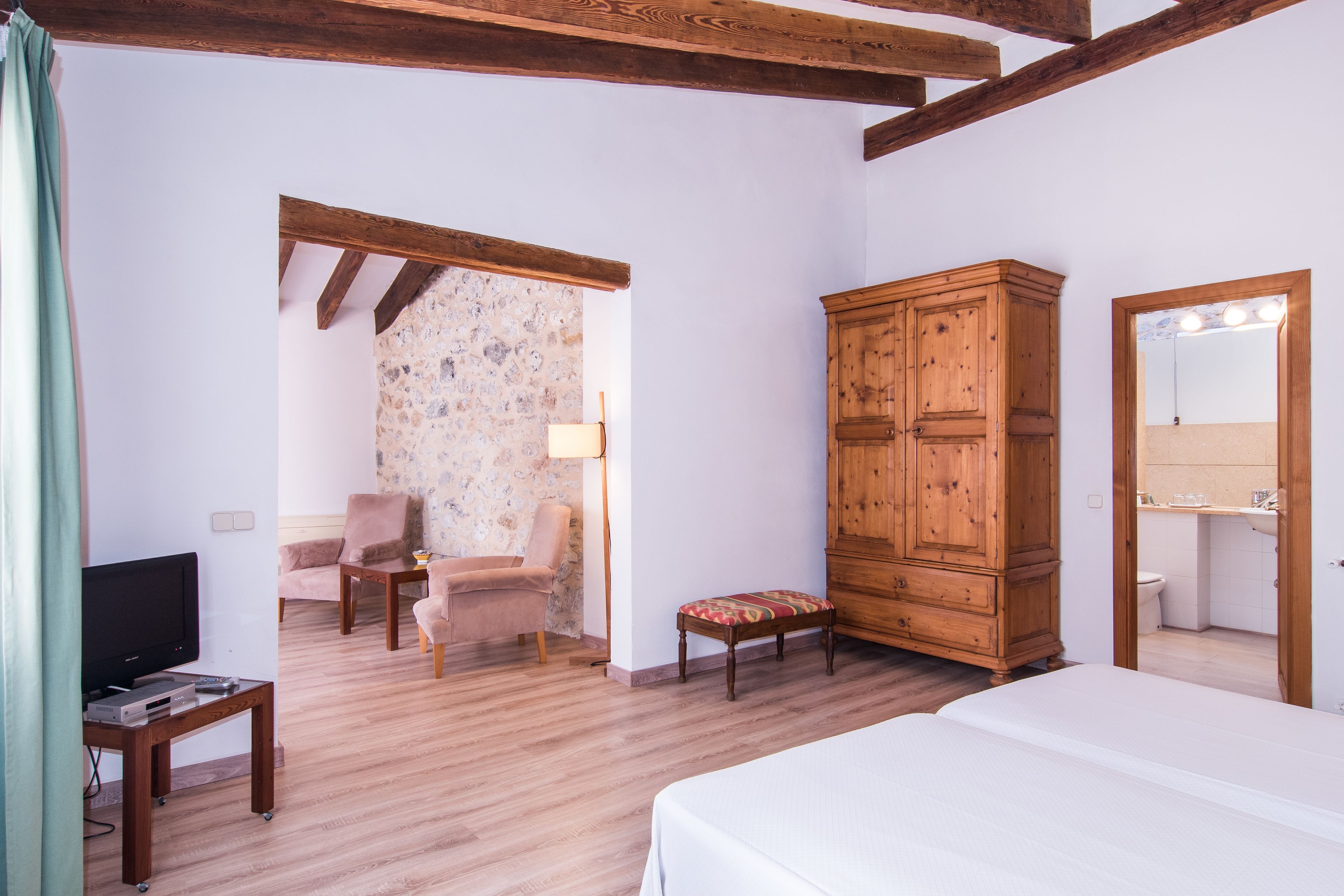 premium bedding, down duvets, memory-foam beds, in-room safe