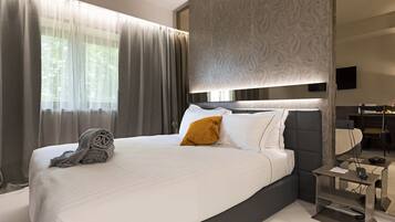 Couette en duvet d'oie, minibar, coffres-forts dans les chambres