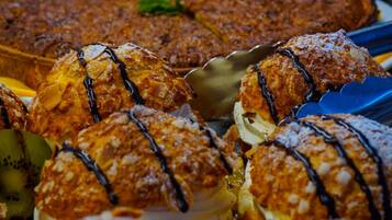 A variety of pastries and desserts on display.