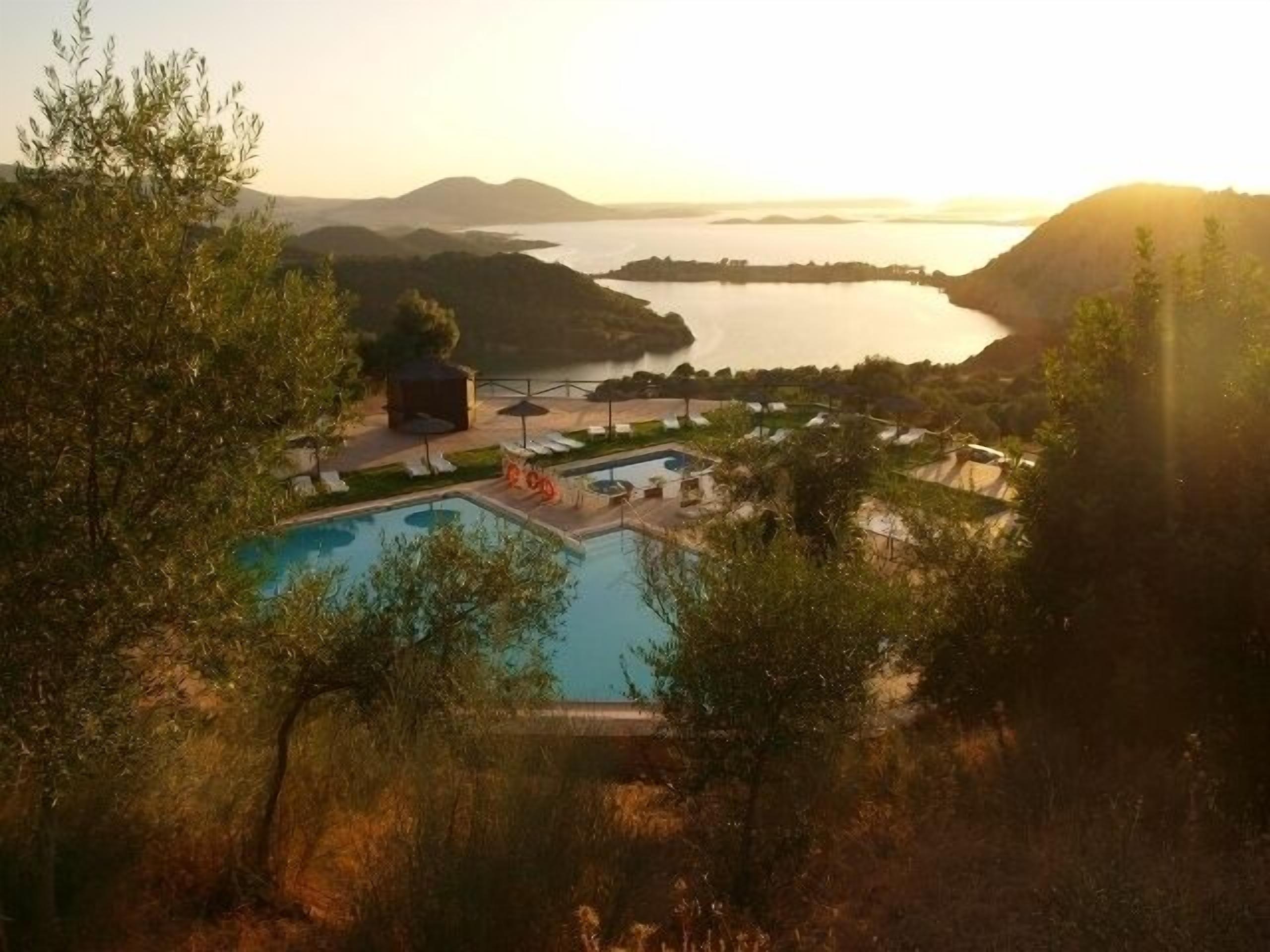 Seasonal outdoor pool, pool umbrellas, pool loungers