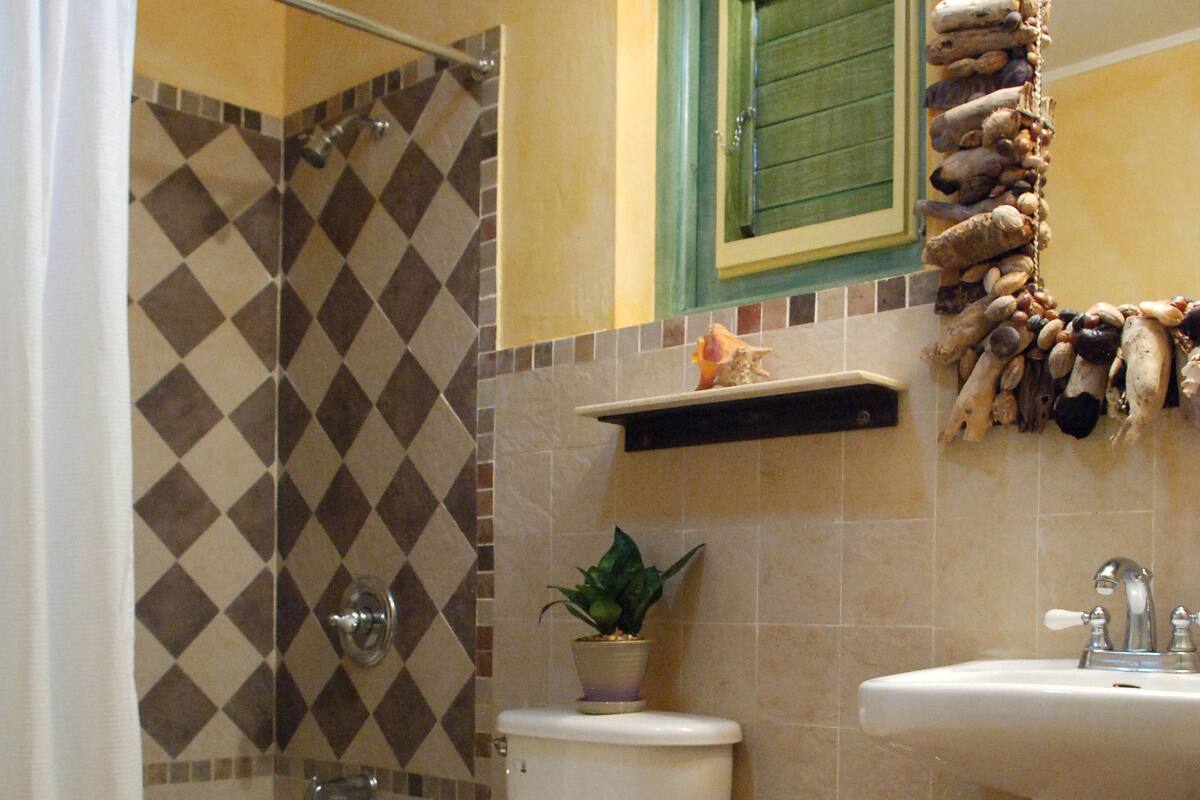 superior cottage | bathroom | shower, free toiletries, hair dryer, towels