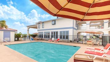 Outdoor pool, open 9:00 AM to 11:00 PM, pool umbrellas, pool loungers