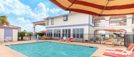 Outdoor pool, open 9:00 AM to 11:00 PM, pool umbrellas, sun loungers