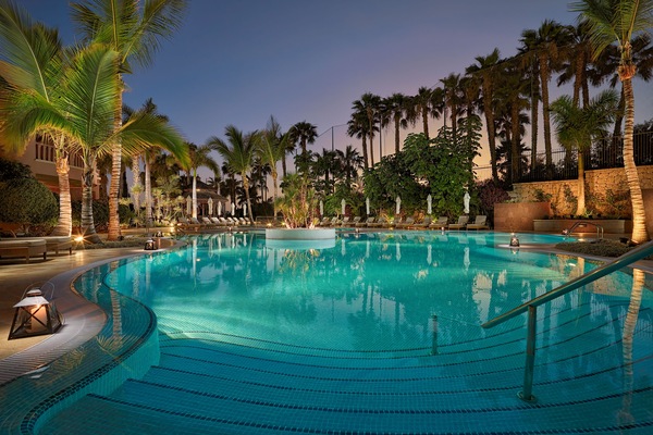 Indoor pool, outdoor pool, pool umbrellas, sun loungers