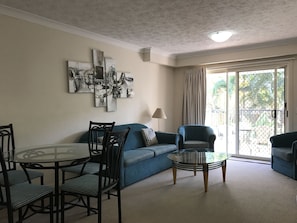 Standard Apartment, 1 Bedroom (Stay 7 Pay 5) | Living area | TV, DVD player - Sunset Island Resort (Surfers Paradise)