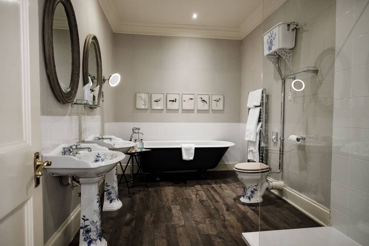 deluxe double or twin room | bathroom | hair dryer, towels