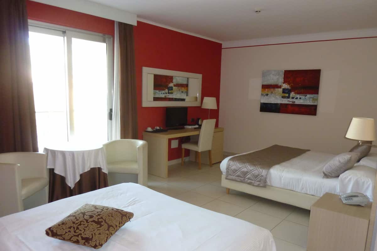 Ropa de cama de alta calidad y minibar