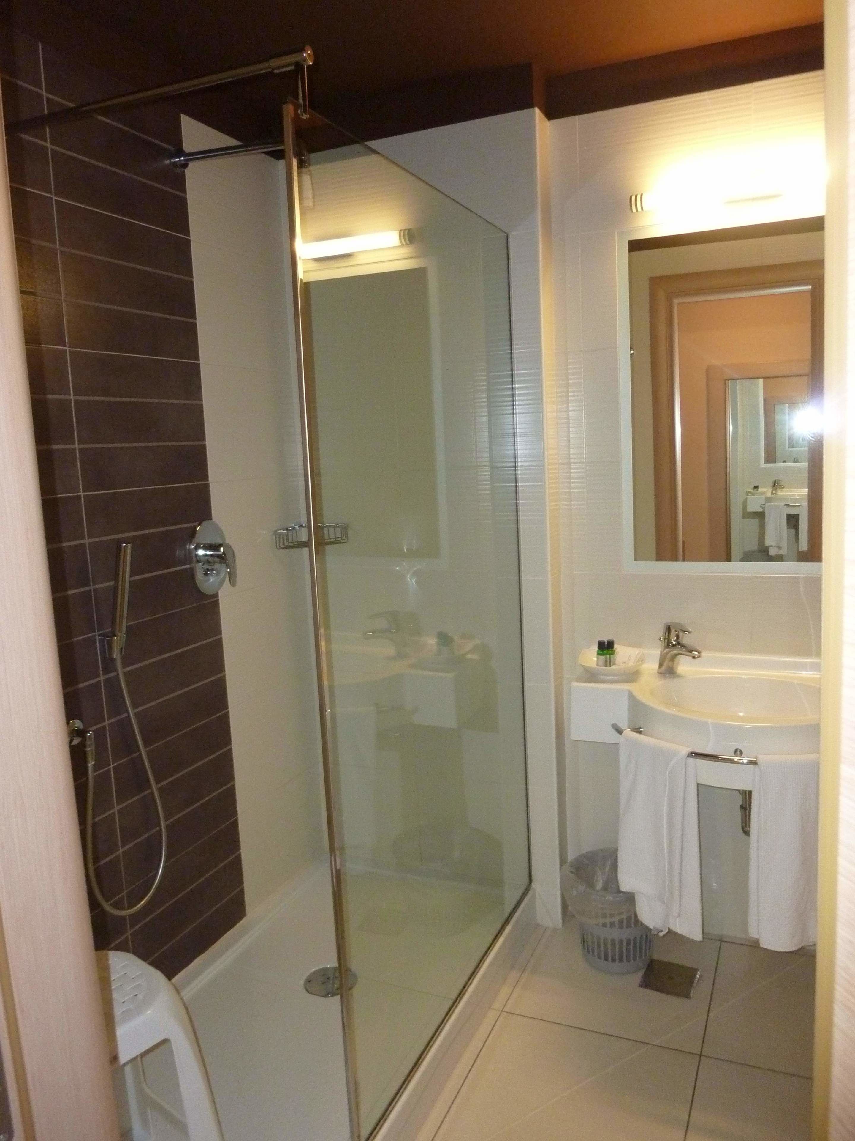 shower, designer toiletries, hair dryer, bathrobes