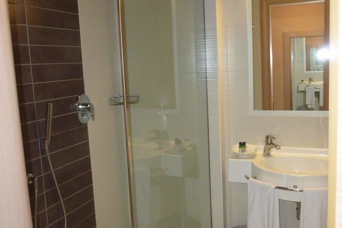 shower, designer toiletries, hair dryer, bathrobes