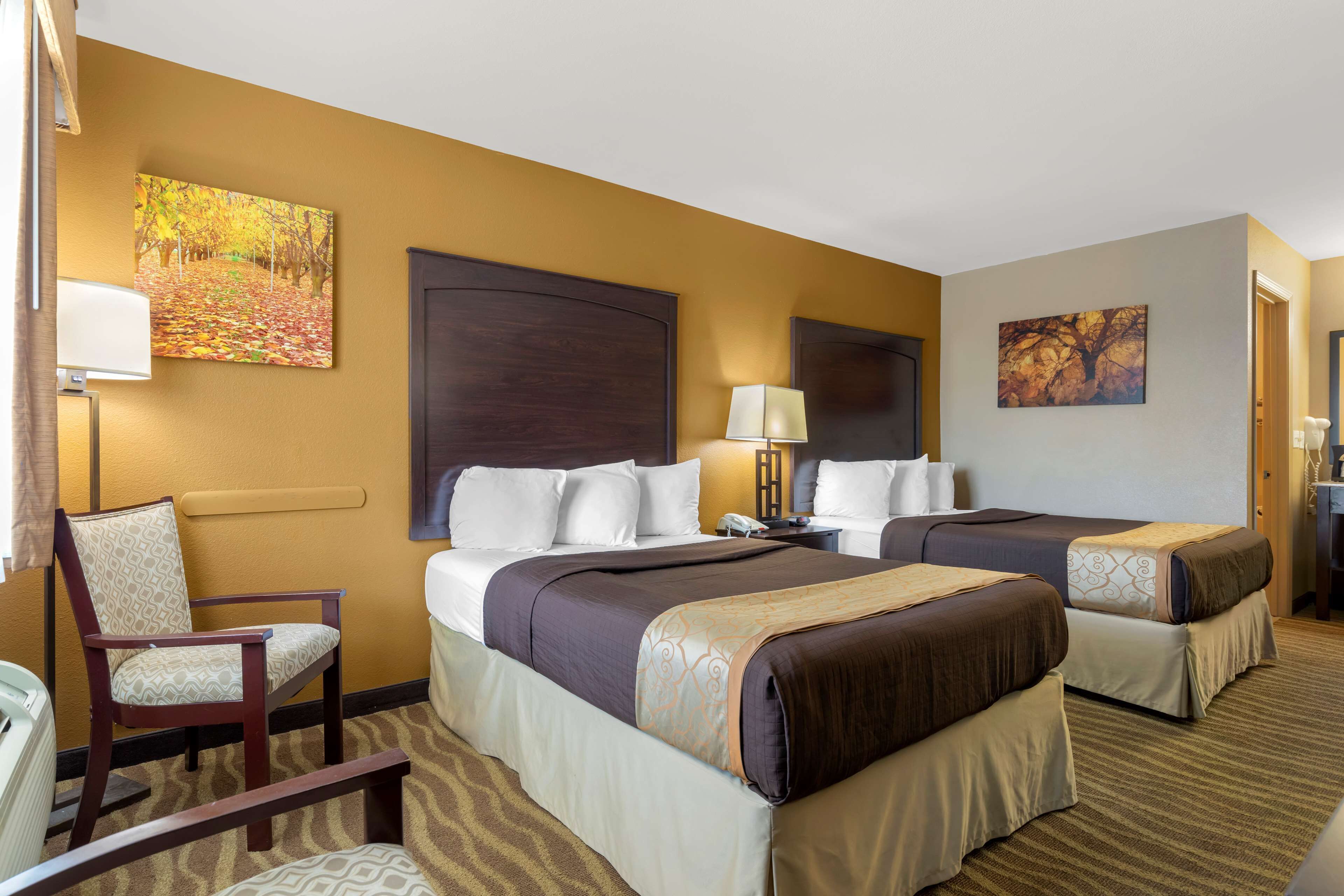 standard room, 2 double beds, non smoking, refrigerator & microwave | in-room safe, desk, laptop workspace, iron/ironing board