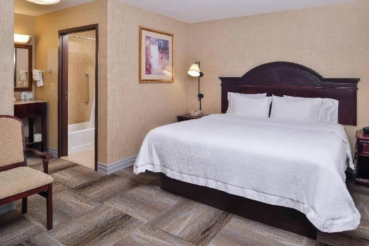 Down duvets, pillow-top beds, in-room safe, desk