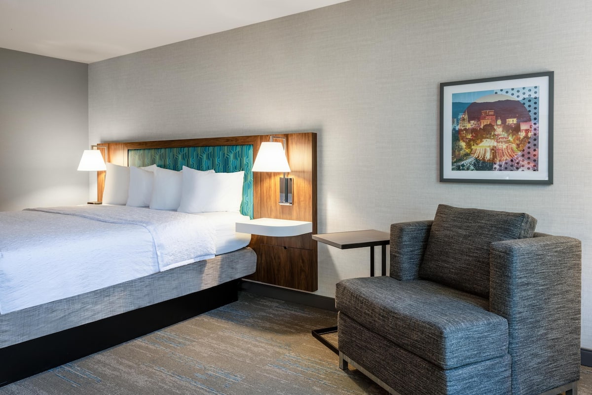 Down duvets, pillow-top beds, in-room safe, desk