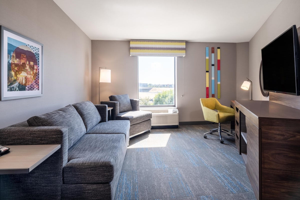 49-inch flat-screen TV with digital channels, iPod dock