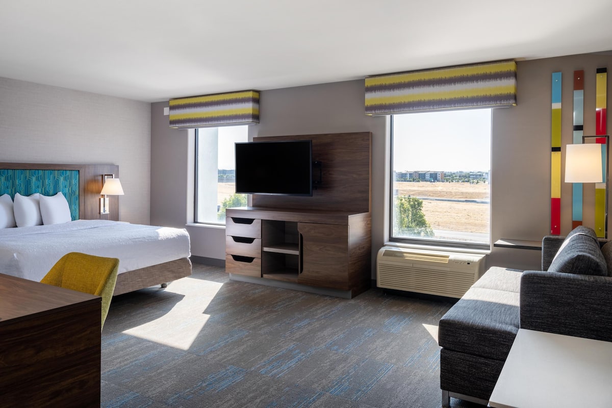 49-inch flat-screen TV with digital channels, iPod dock