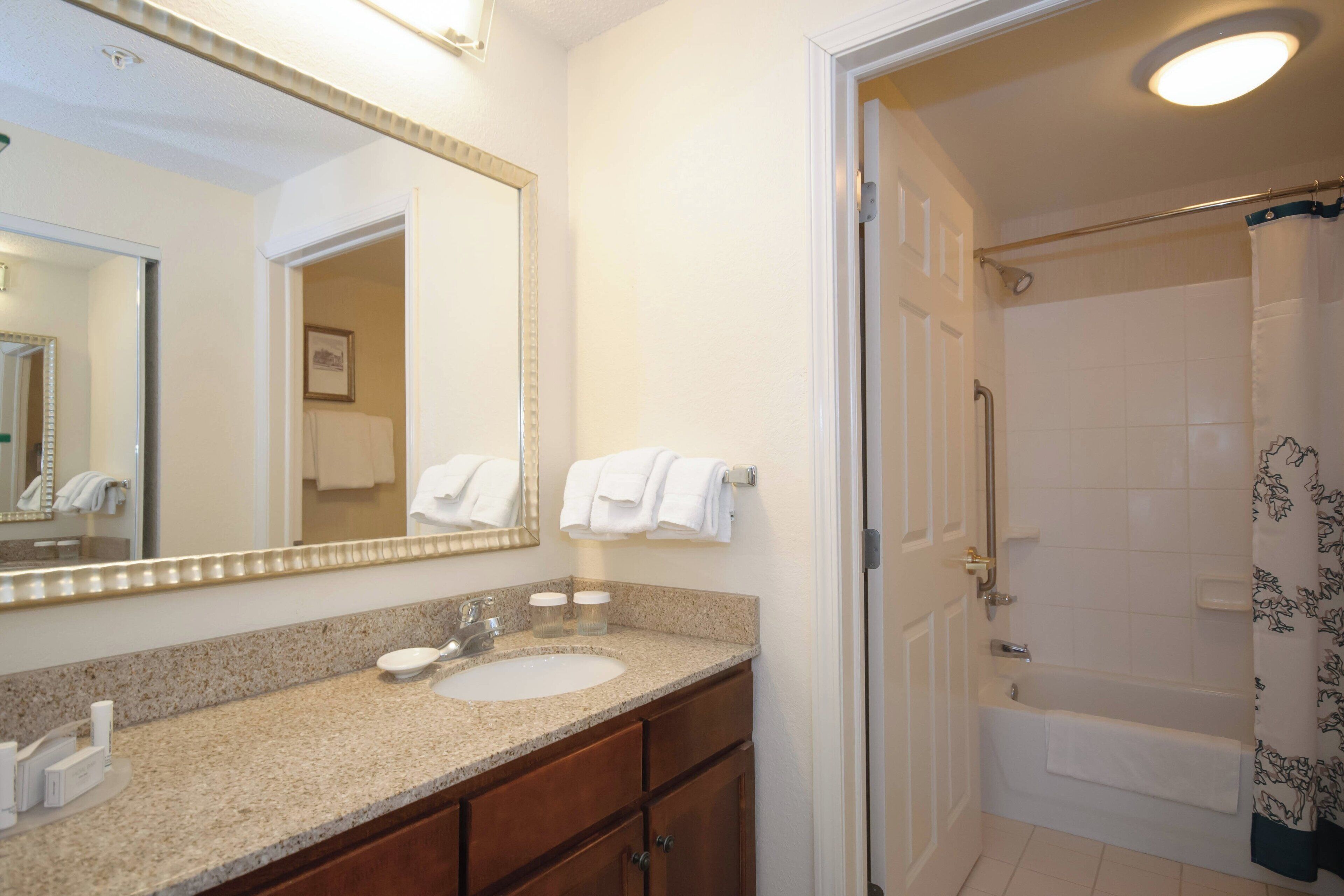 combined shower/bathtub, free toiletries, hair dryer, towels