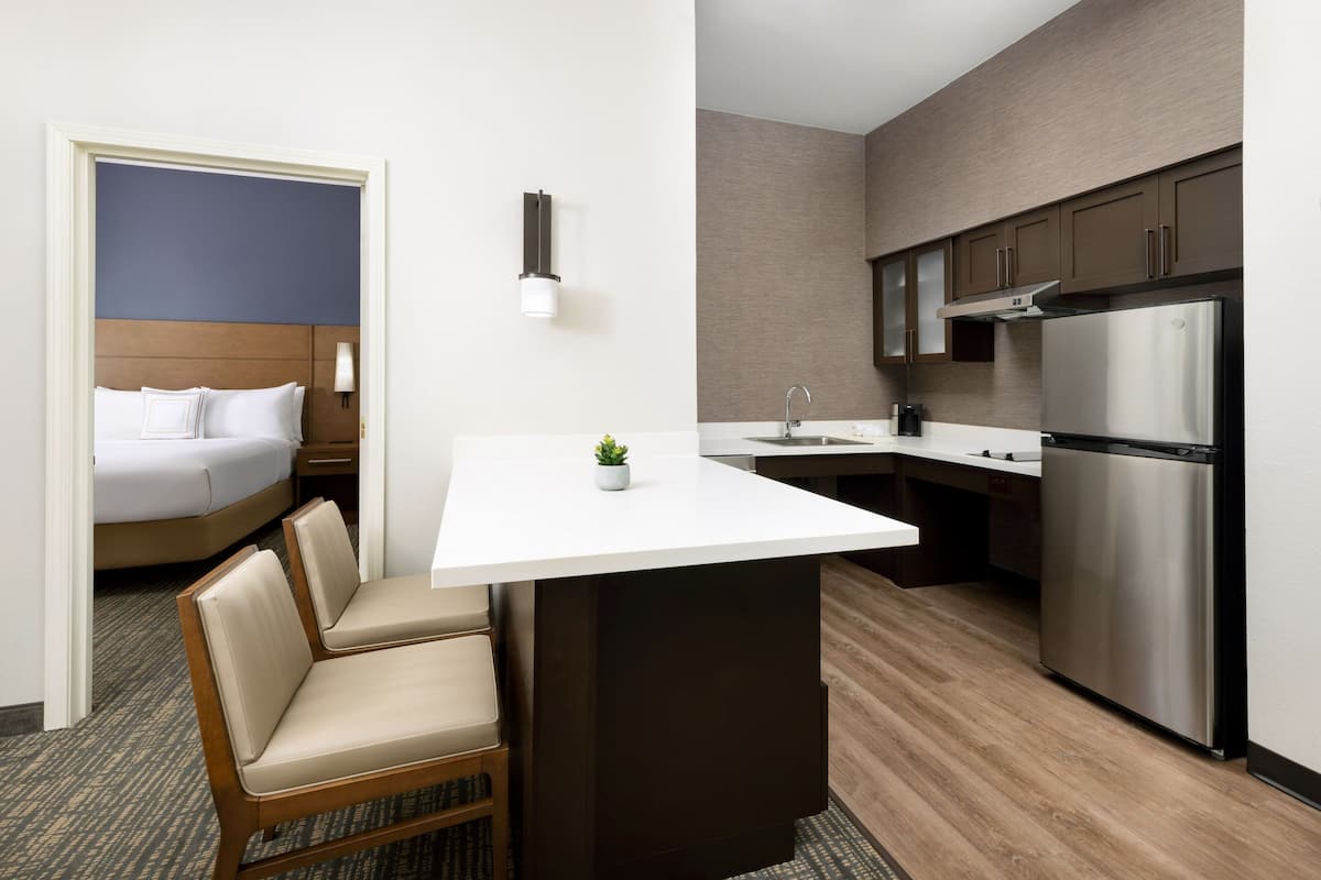 Full-sized fridge, microwave, stovetop, dishwasher