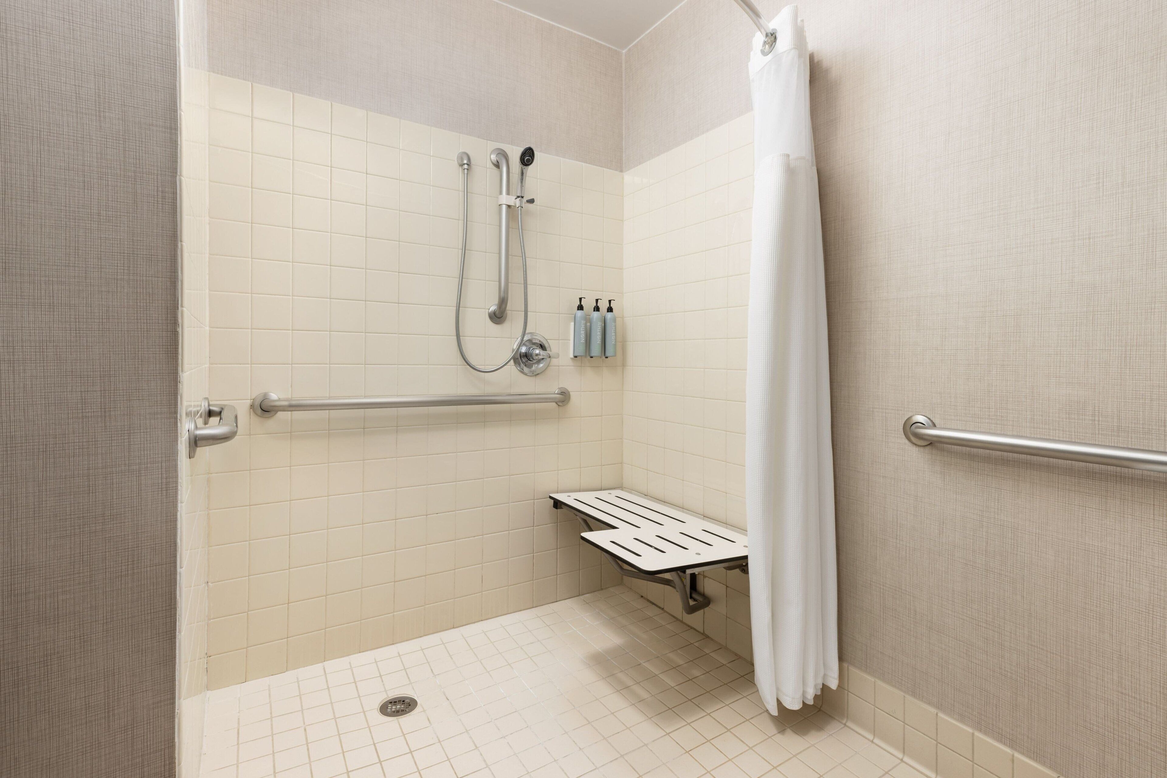 combined shower/bathtub, free toiletries, hair dryer, towels