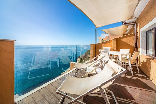 Deluxe Suite, Sea View (Family) | In-room safe, desk, laptop workspace, blackout curtains