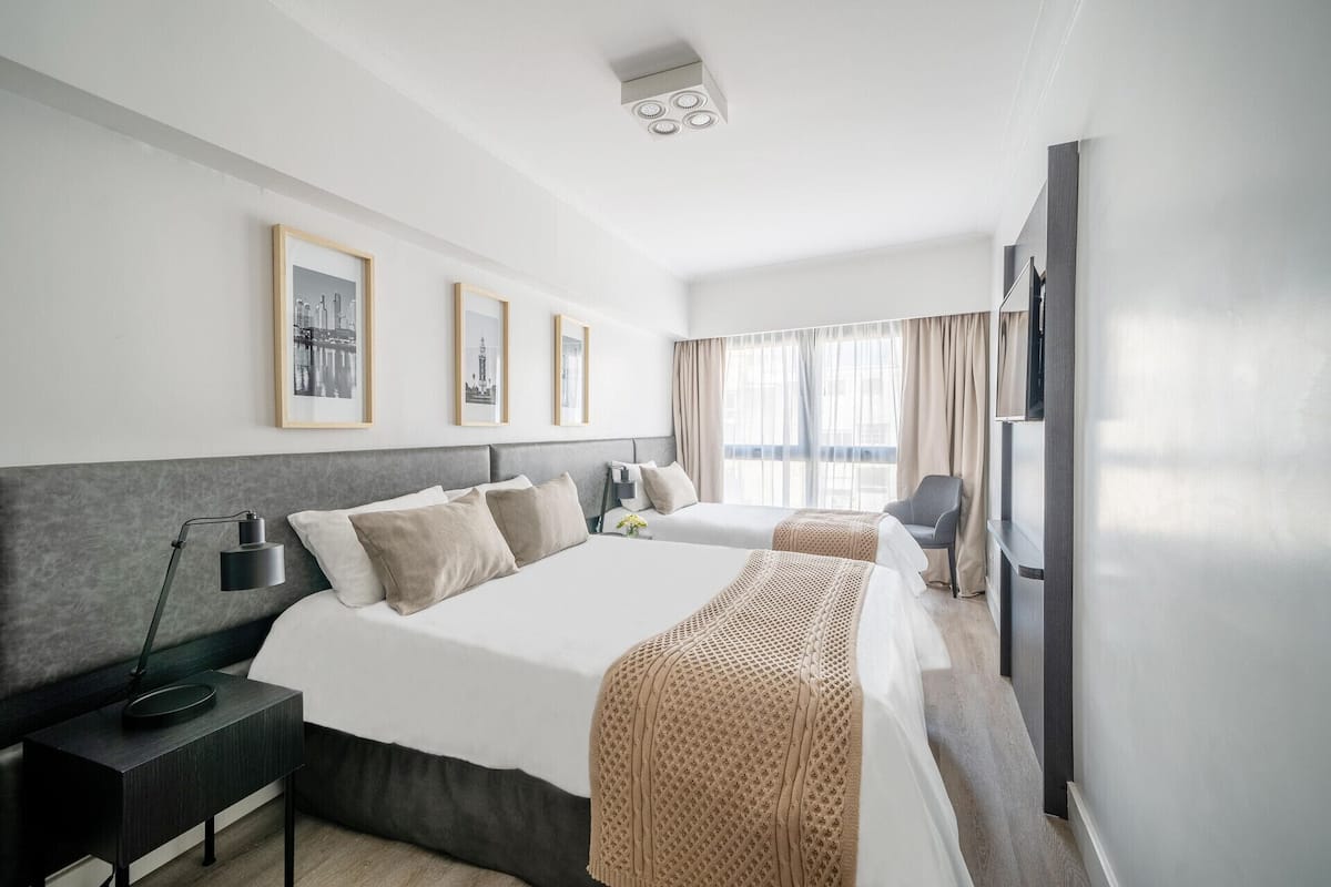 Premium bedding, down comforters, pillowtop beds, minibar