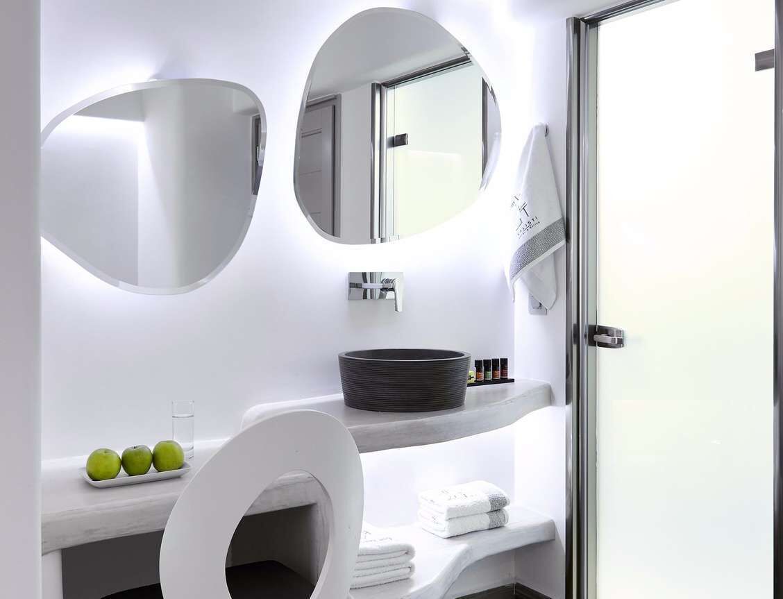 elegant white deluxe room with private balcony | bathroom sink