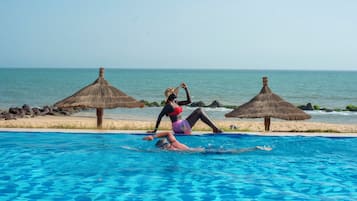 Outdoor pool, pool umbrellas, pool loungers