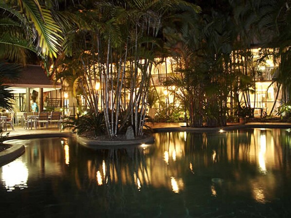 Outdoor pool, open 8:00 AM to 10:00 PM, sun loungers