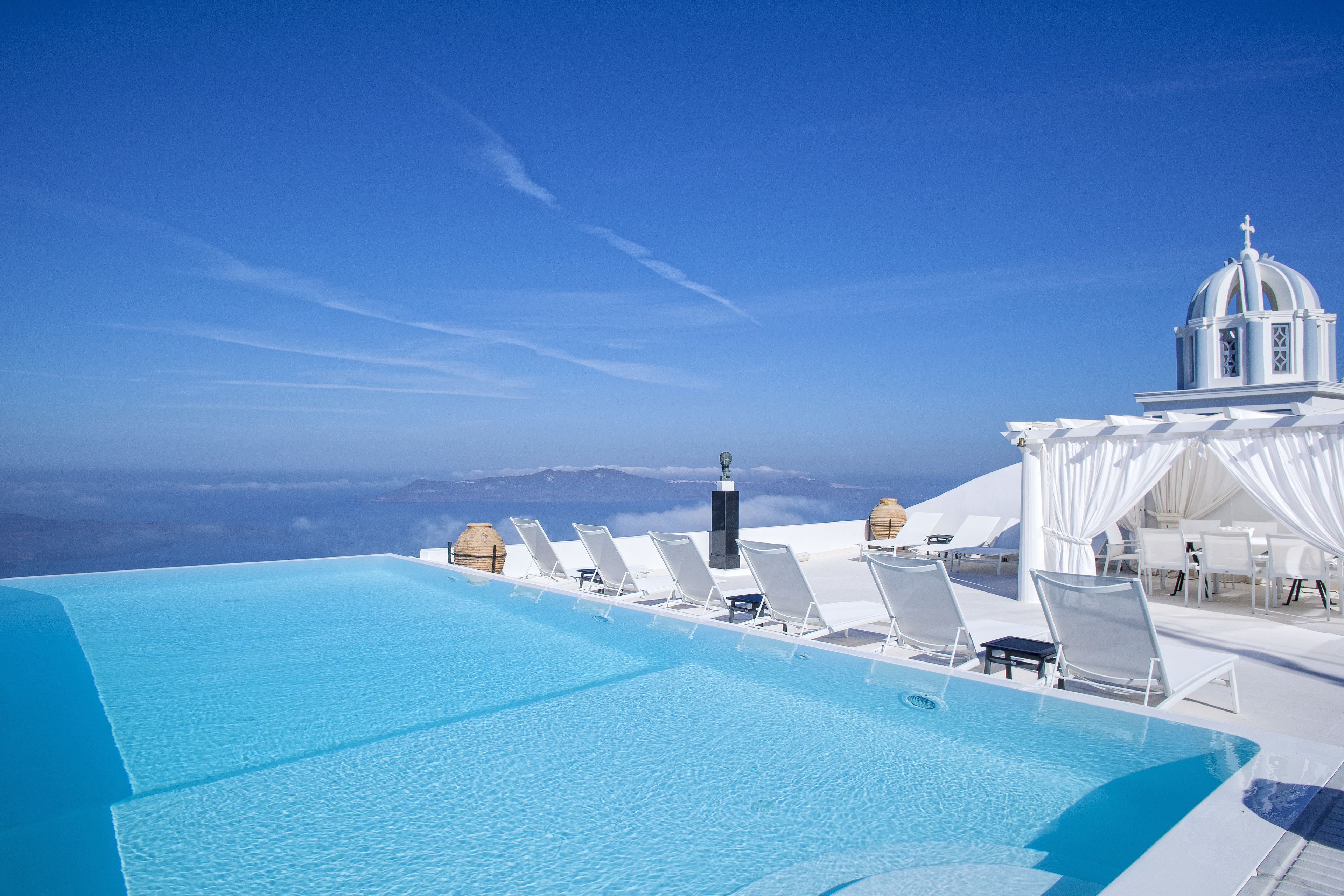 outdoor pool, open 8:00 am to 8:00 pm, pool umbrellas, pool loungers