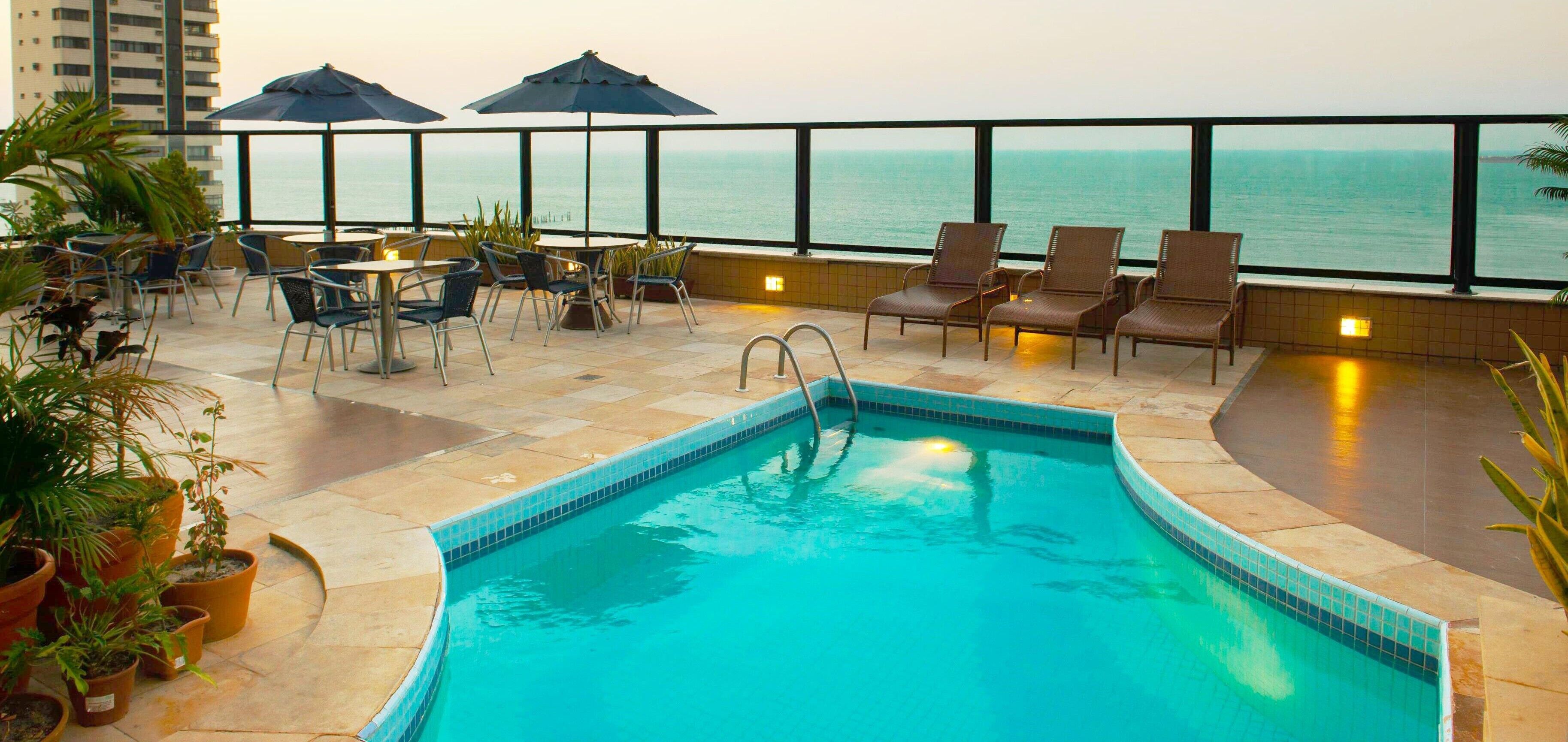 Outdoor pool, pool umbrellas, pool loungers