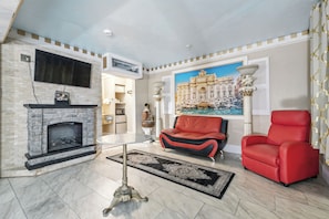 Suite, 1 King Bed, Non Smoking (Roman) | In-room safe, soundproofing, iron/ironing board, free cribs/infant beds