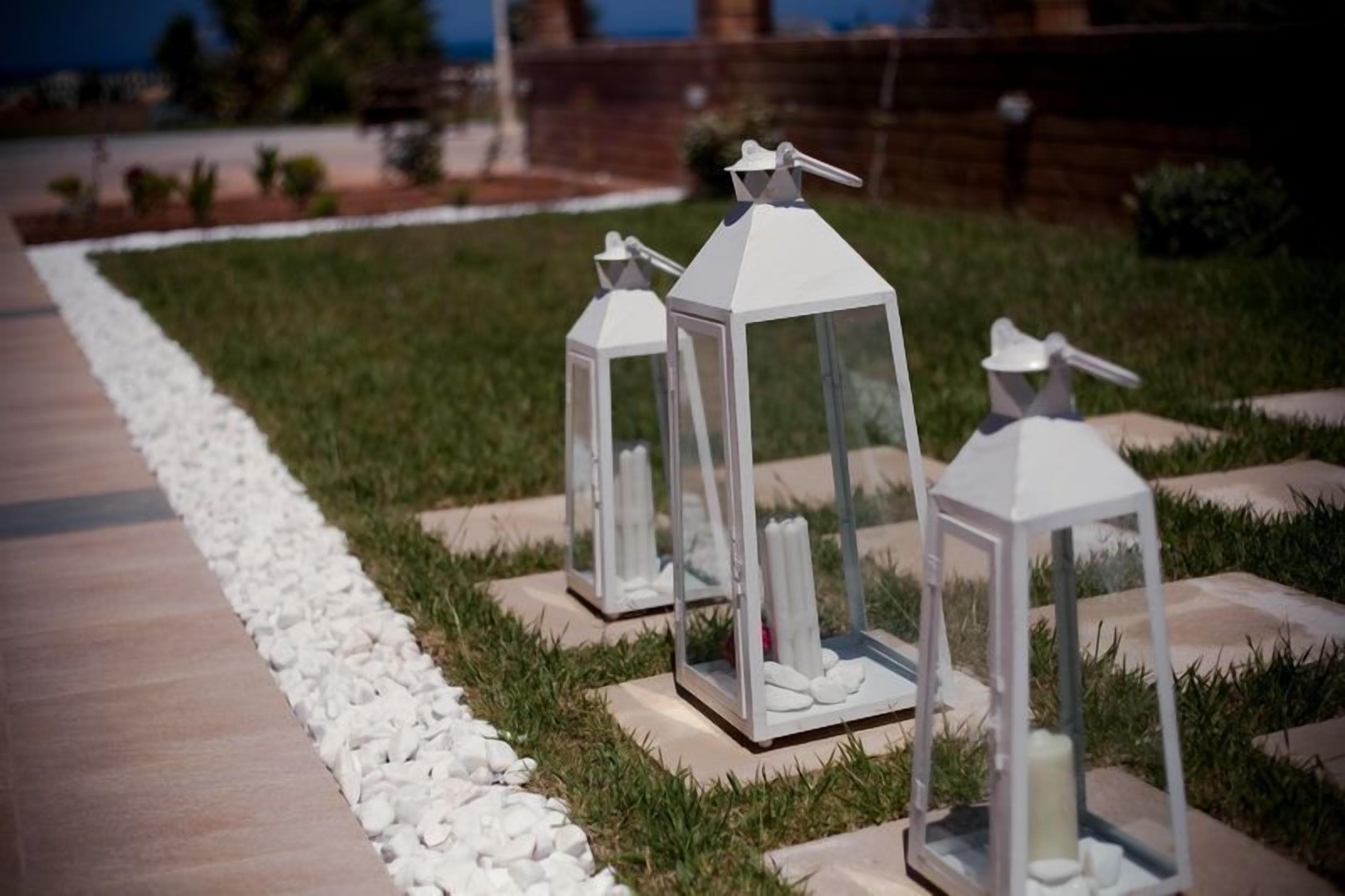 Outdoor lanterns on a pathway.