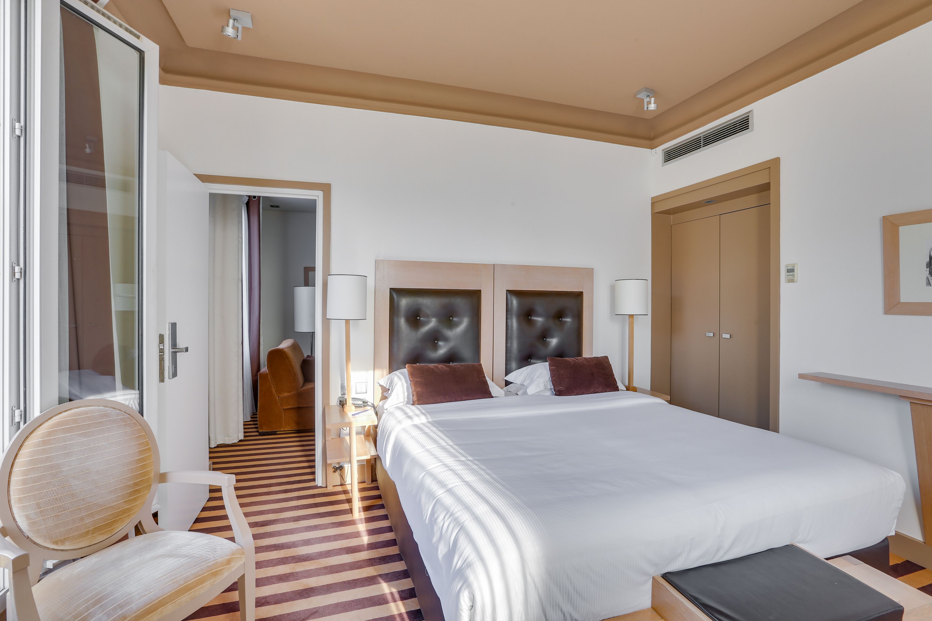 Premium bedding, pillow-top beds, minibar, in-room safe