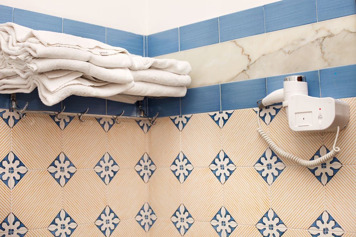 family quadruple room | bathroom | hair dryer, bathrobes, bidet, towels