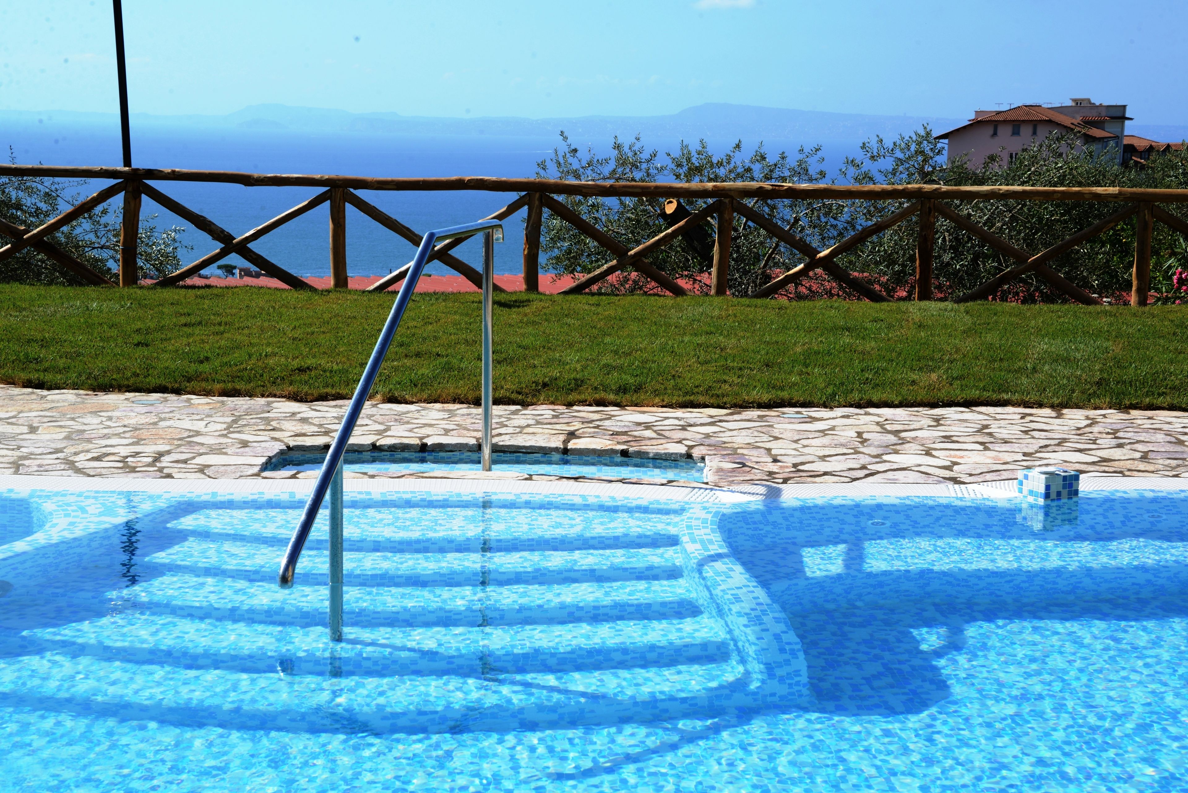 outdoor pool, pool umbrellas, pool loungers