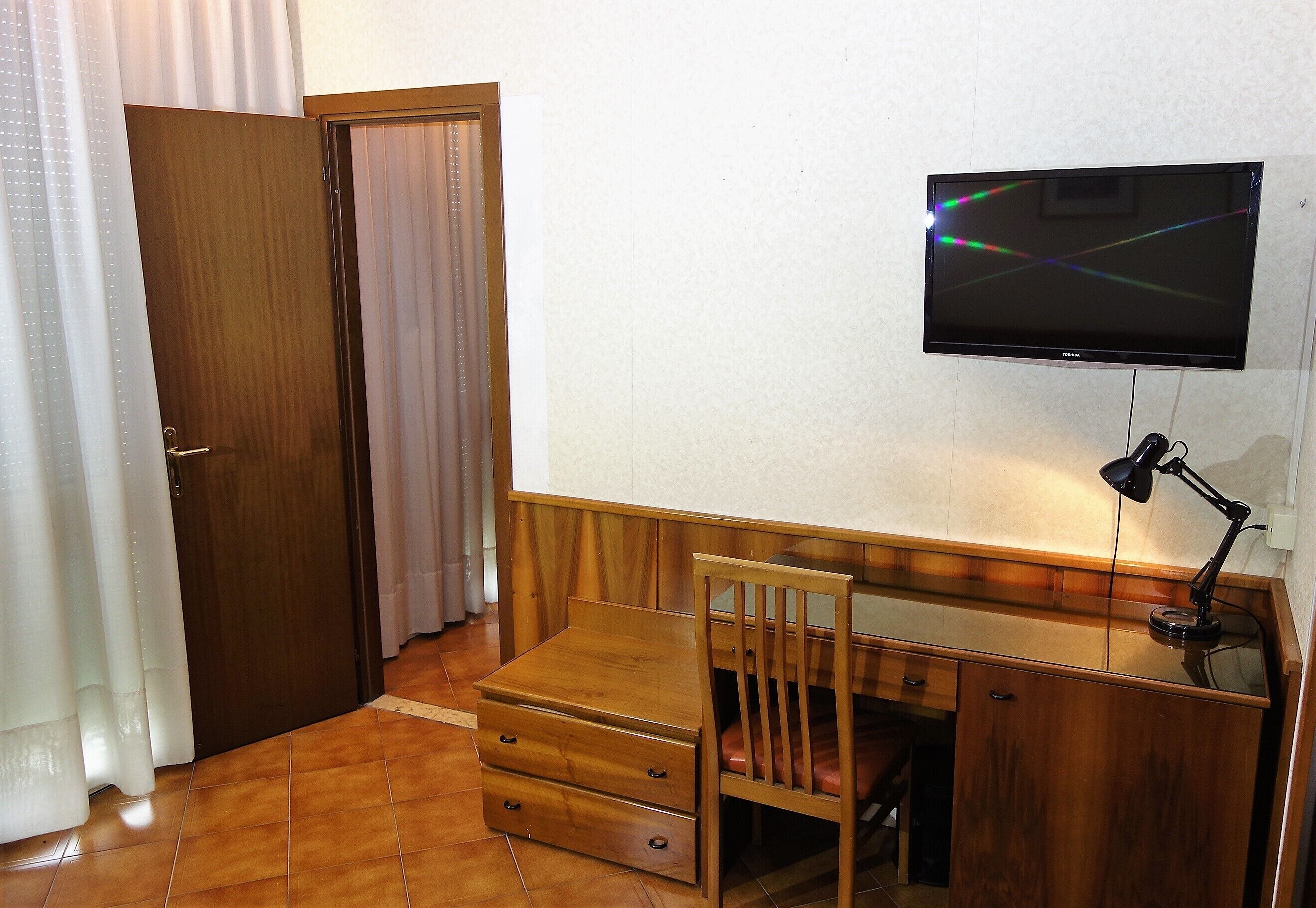 family room, 2 bedrooms | 1 bedroom, in-room safe, desk, free wifi