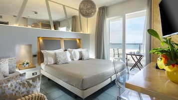 Deluxe Double Room, Sea View | Minibar, in-room safe, desk, iron/ironing board