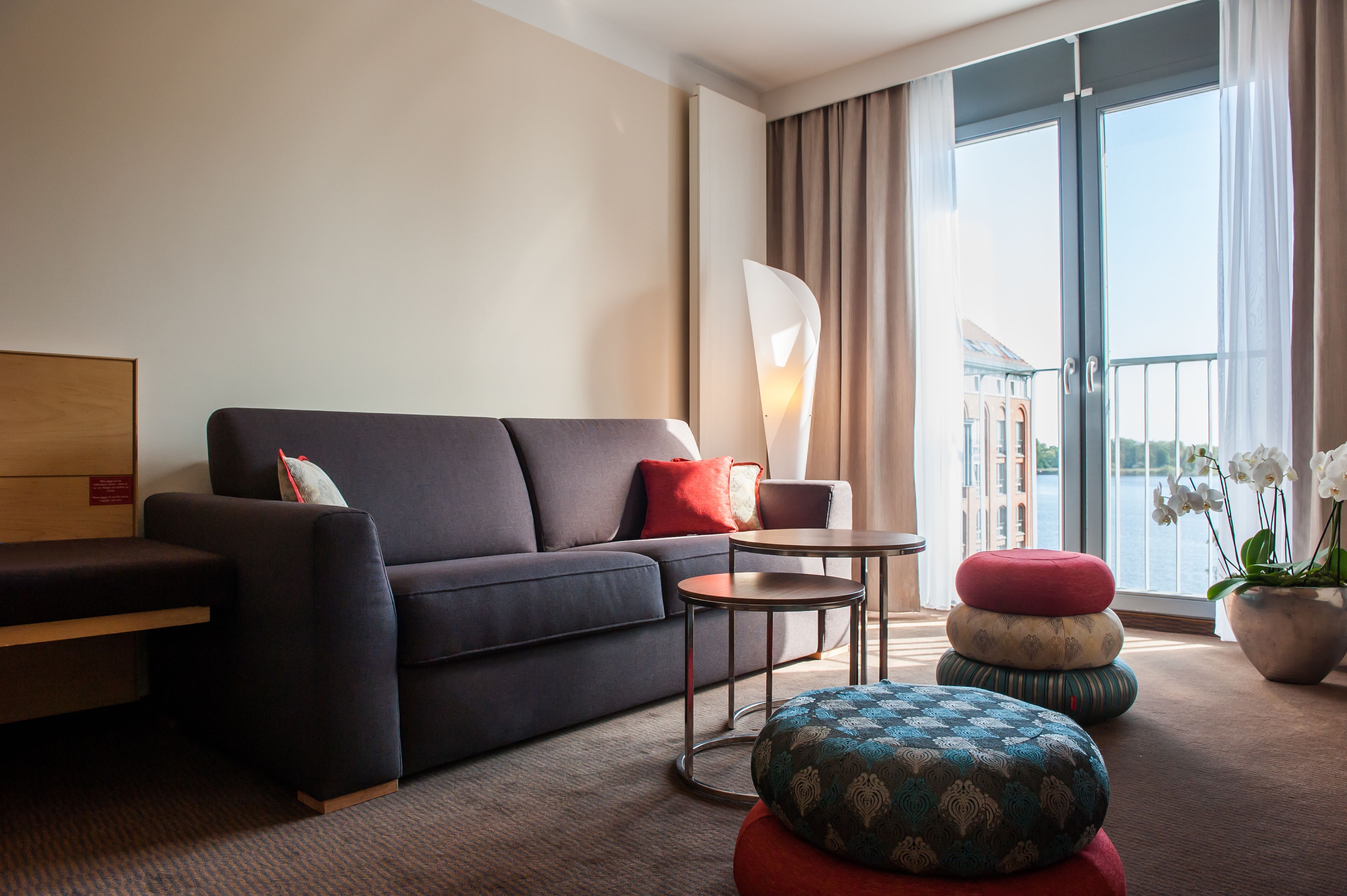 junior suite, lake view | living room | 32-inch lcd tv with satellite channels, tv