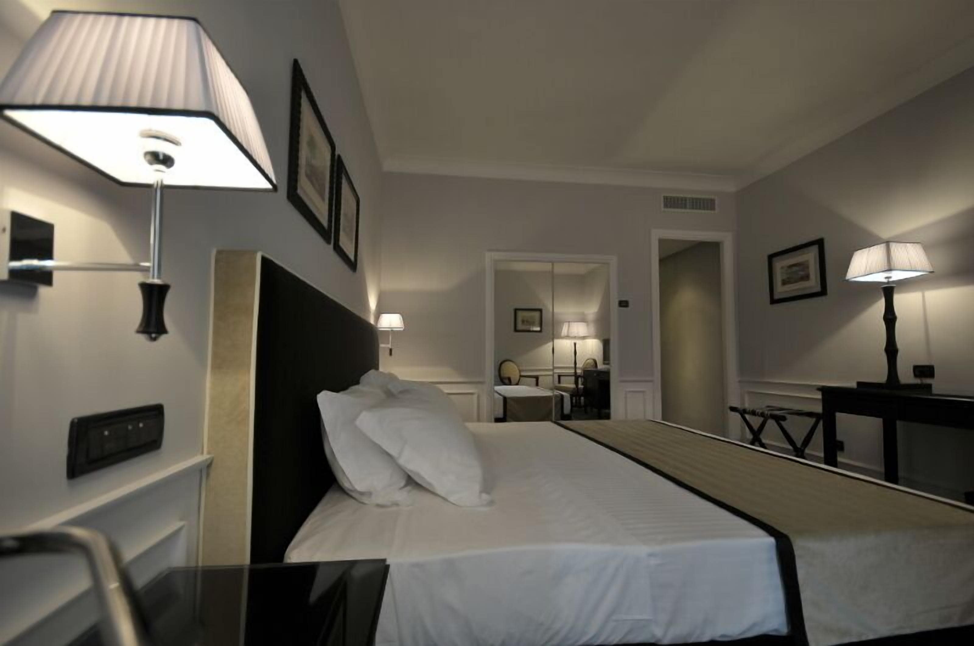 premium bedding, down duvets, minibar, in-room safe